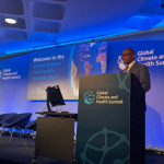 An image of a speaker at the Global Climate and Health Summit